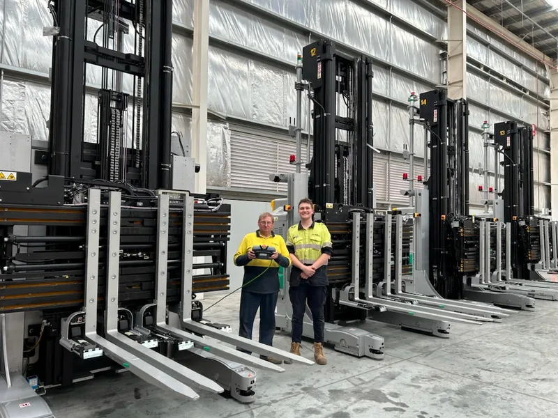 Fleet of automated guided forklifts in a distribution warehouse