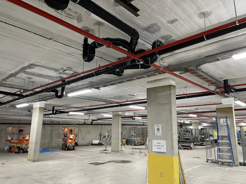 Overhead electrical and communications services in a new food facility